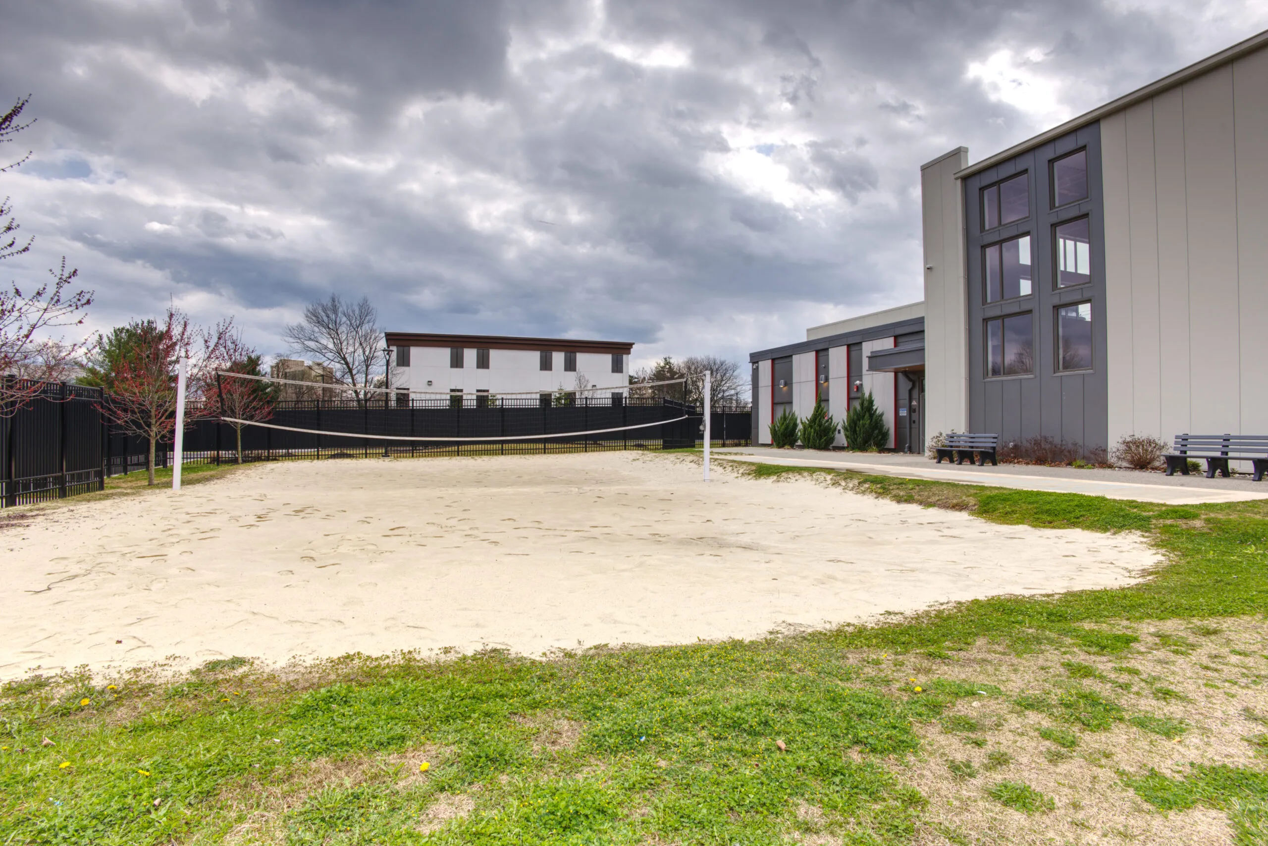 Sand volleyball court at The Recovery Village Cherry Hill at Cooper
